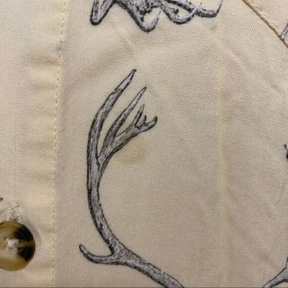 unique antlers on an ivory colored button down top - Picture 4 of 10